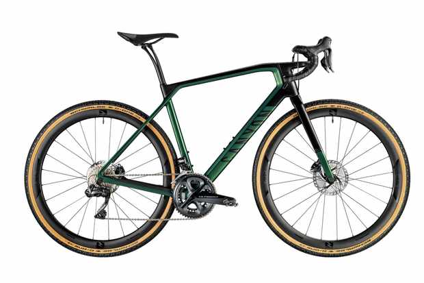 A photograph of a green and black gravel bicycle on a white background