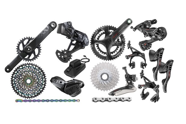Collage of black and silver bicycle groupset parts on a white background