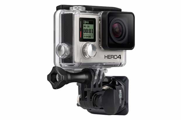 Photo of a GoPro camera on a helmet mount, on a white background