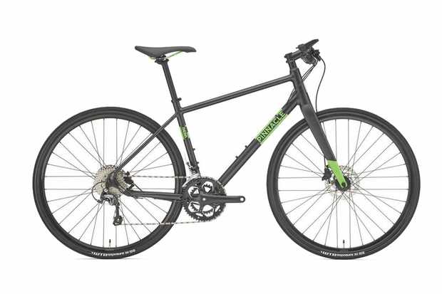 Photo of a black hybrid bike with the brand name Pinnacle written in green on the frame